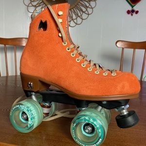 Vibrant Orange High-Top Roller Skates with Retro Wheels